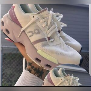 On Running White and Purple Sneakers